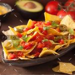 demo-attachment-1166-nachos-loaded-with-salsa-guacamole-cheese-and-P7GUFN7