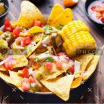 demo-attachment-1167-nachos-with-melted-cheese-sauce-salsa-corn-cobs-PMBWCHA