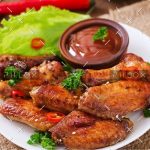 demo-attachment-1165-sour-sweet-baked-chicken-wings-and-sauce-PYAGX99